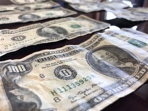 How to spot fake money when selling at garage sales or online 